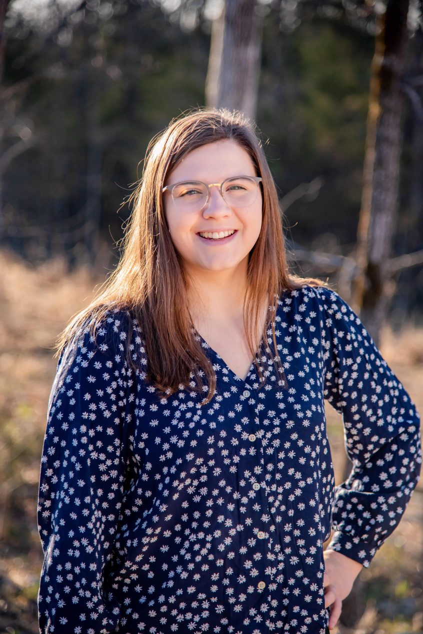 A Robbins Insurance Group employee poses for a headshot