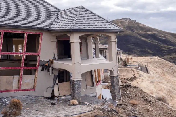 House with siding damage