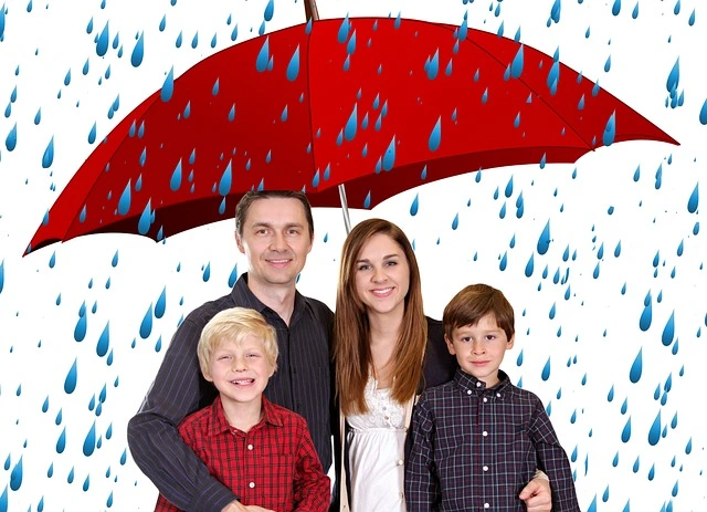 a family standing under an umbrella insurance